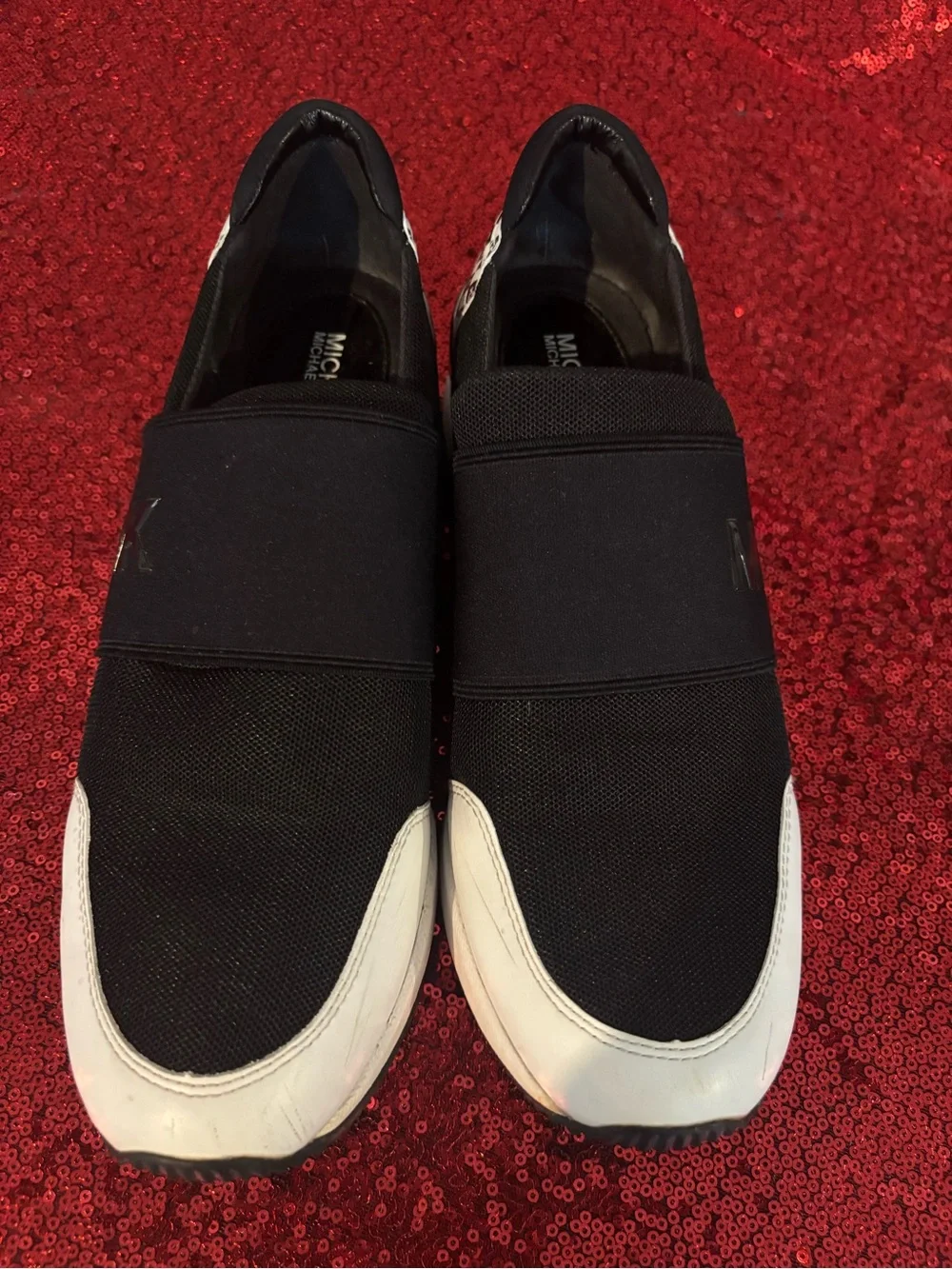 Michael Kors Black and White Slip-On Sneakers with Logo Heel Accent